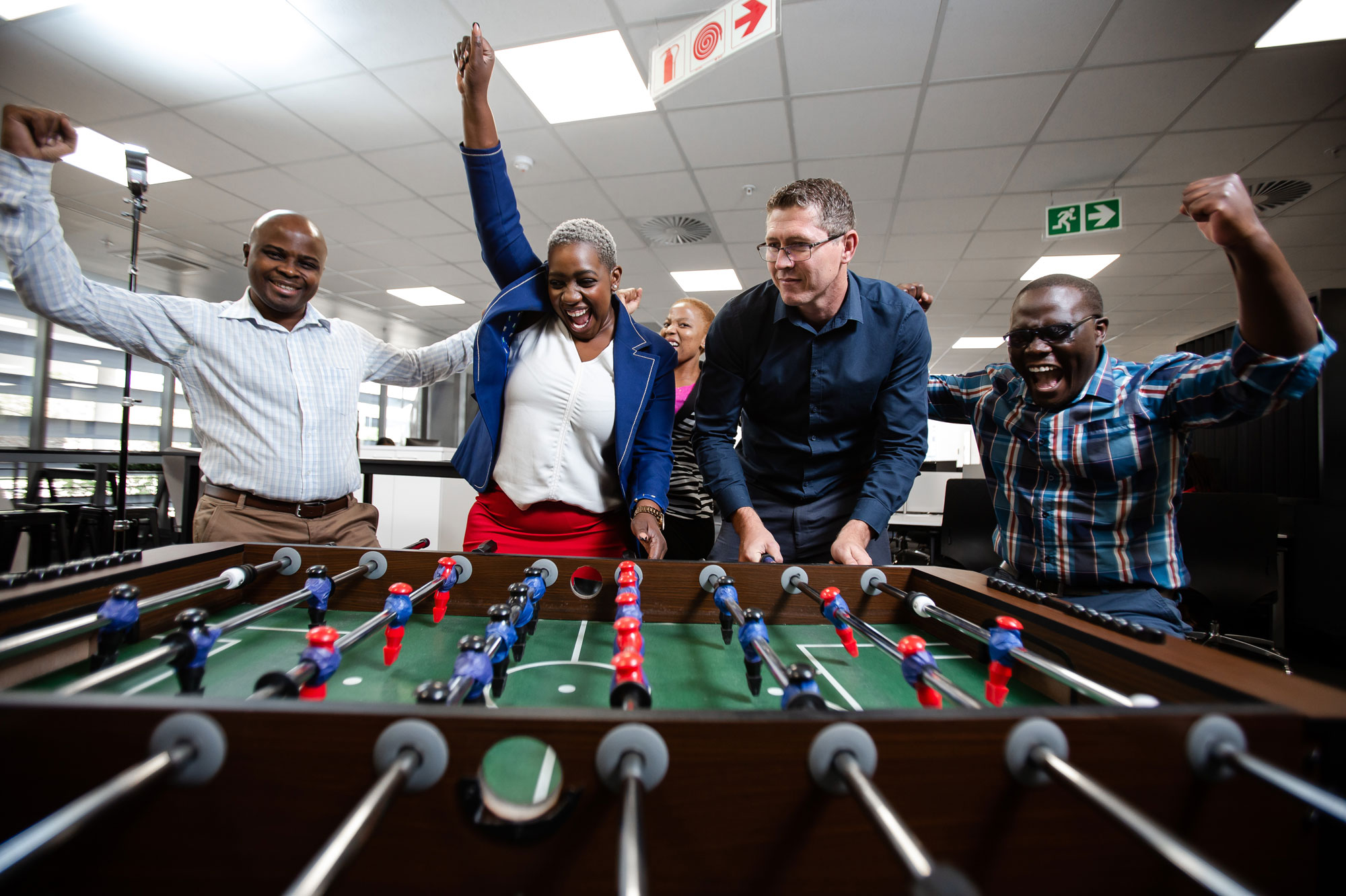 Office Workers Playing Table Soccer